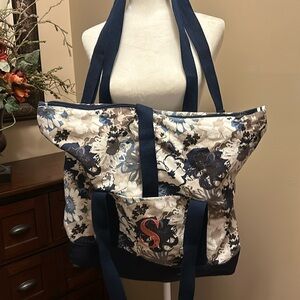 Large thirty-one navy travel bag.